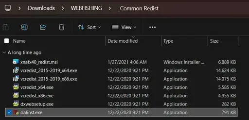 Image of my common redist folder for a downloaded game, featuring the oalinst.exe file